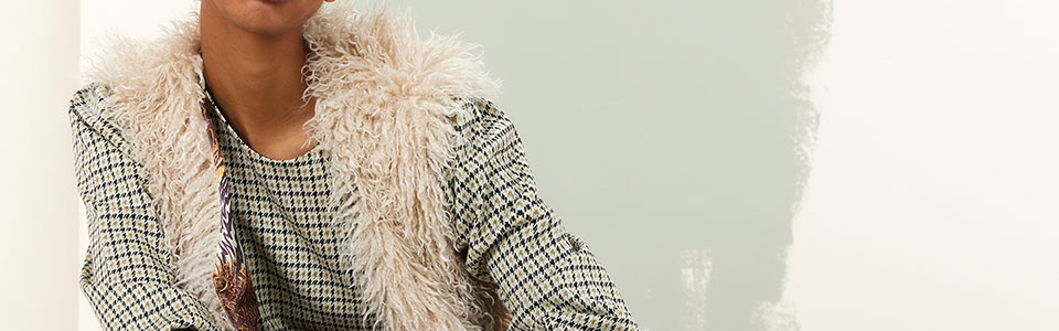 Ärmellose Strickjacken/Gilets